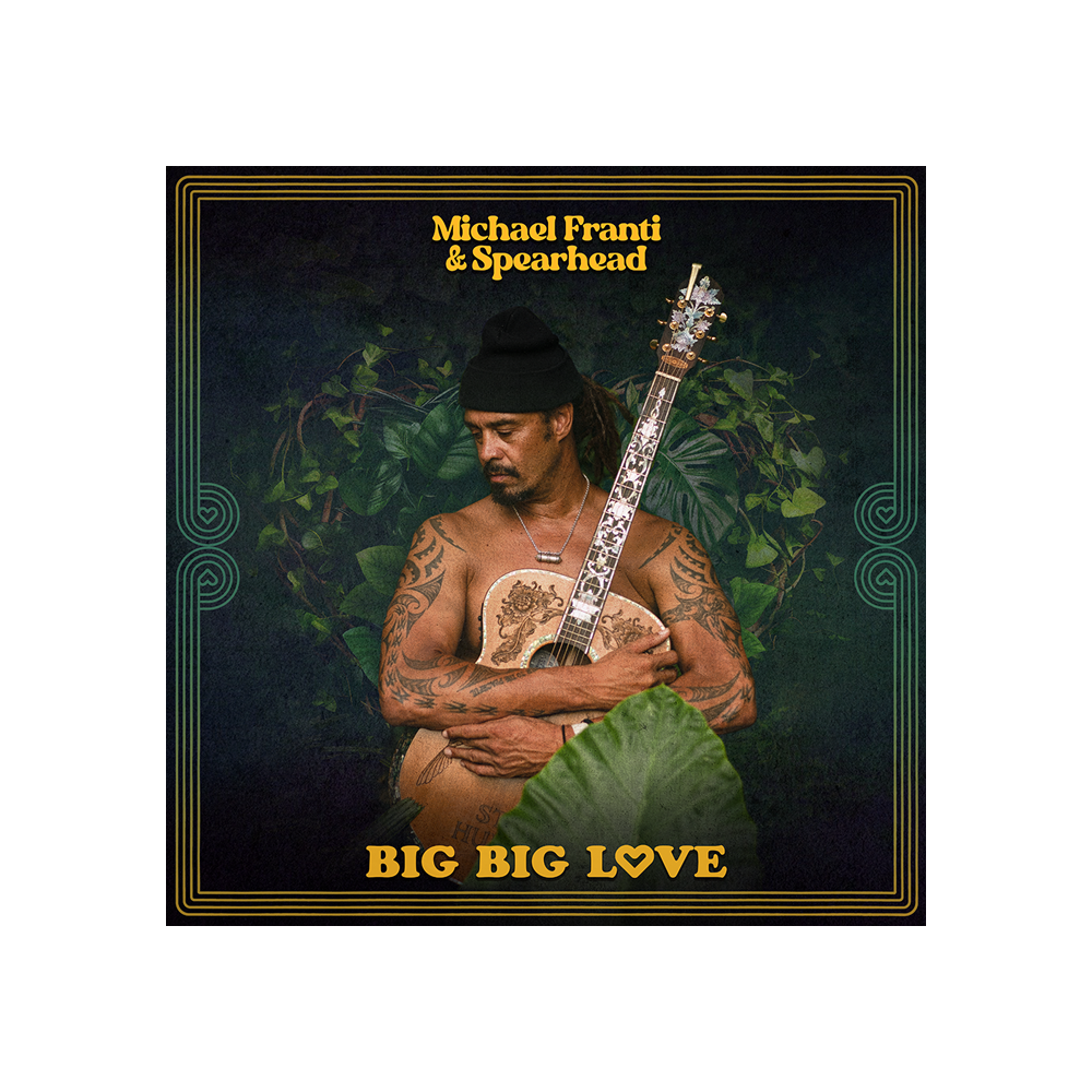 Album cover featuring a shirtless man with tattoos holding an ornate guitar against a leafy background.