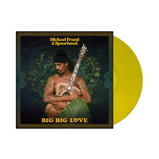 Album cover featuring a shirtless man holding a guitar, titled ’Big Big Love’ by Michael Franti & Spearhead.