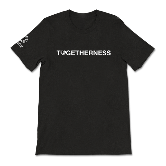 Black t-shirt with ’TOGETHERNESS’ printed in white text on the front.