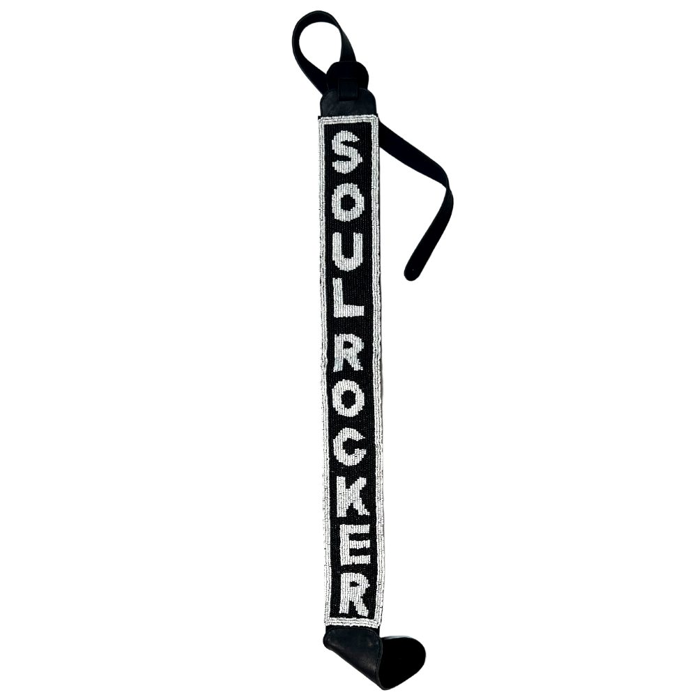 Black and white lanyard with ’SOULROCKER’ printed vertically in bold letters.