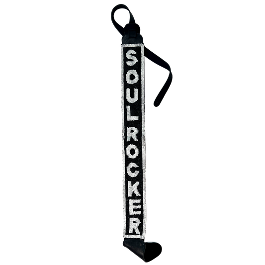 Black and white lanyard with ’SOULROCKER’ printed vertically in bold letters.