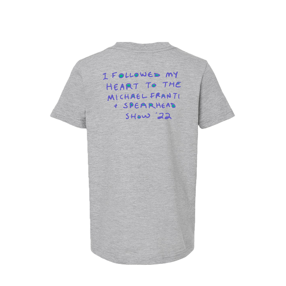 Gray t-shirt with blue handwritten text on the back.